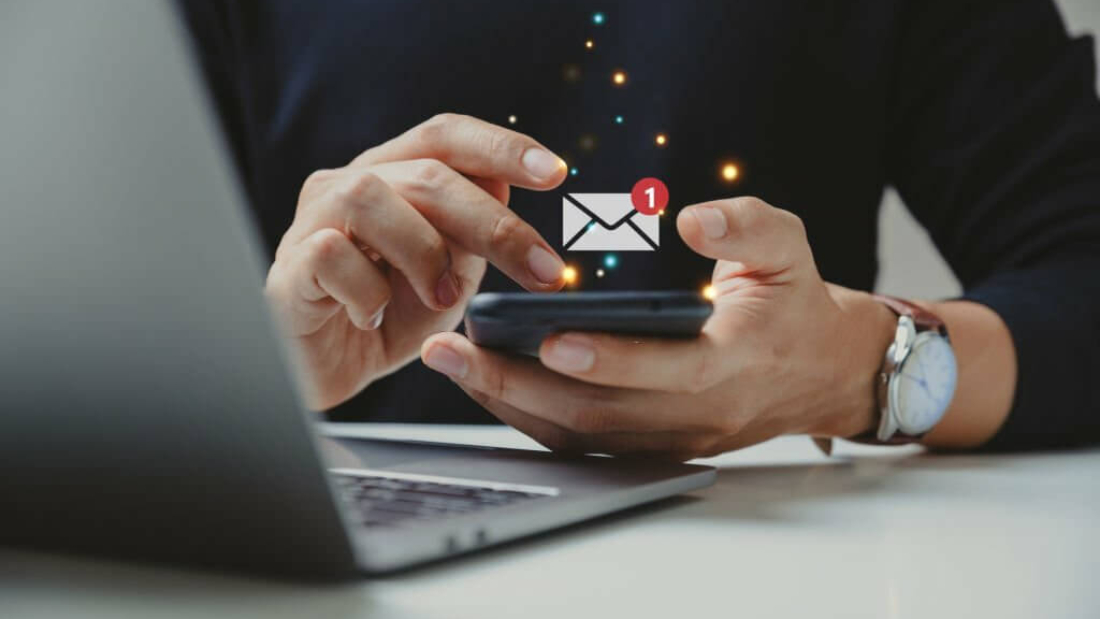 Hand of businessman using smartphone for email with notification alert, Online communication concept.